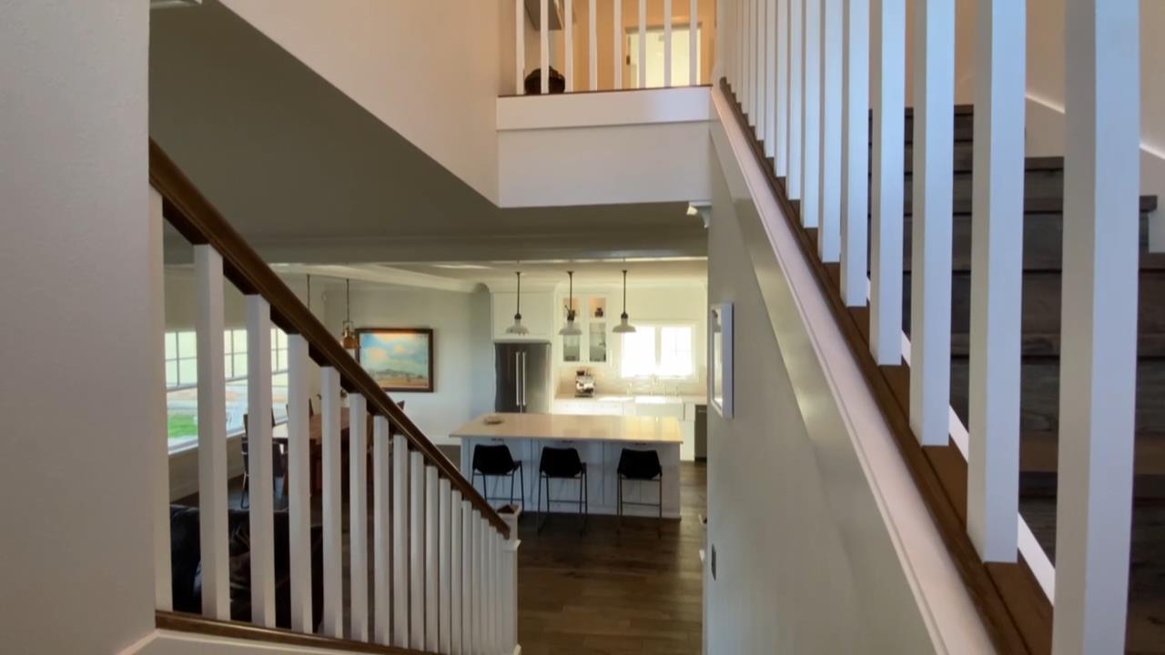 Custom Home Builder with wood stairs