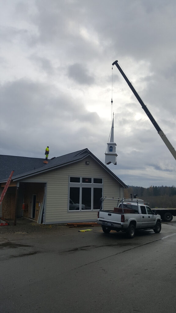 Steeple being installed for Church in Allyn during Commercial Renovation