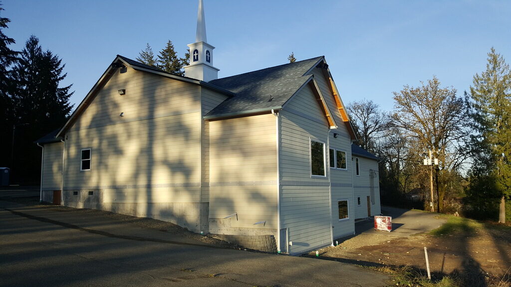 Steeple installed and siding completed for Church in Allyn during Commercial Renovation