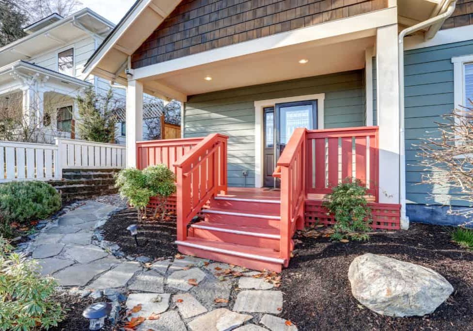 nice craftsman home with covered red porch