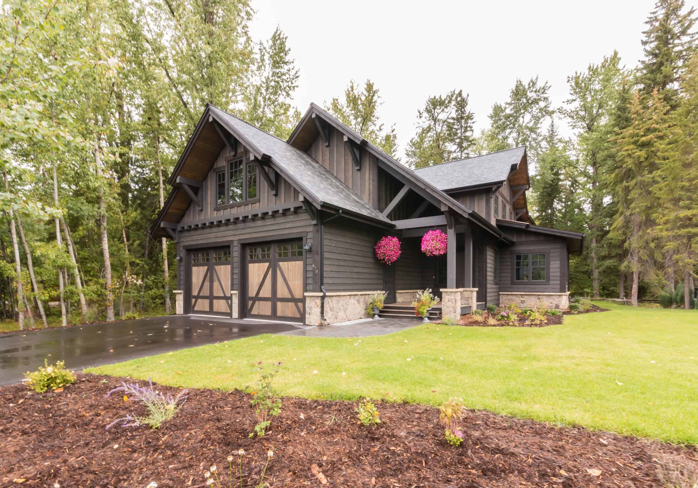 exterior of montana home with surrounding forest
