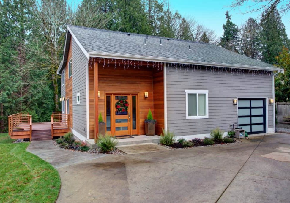 charming newly renovated home exterior with mixed siding