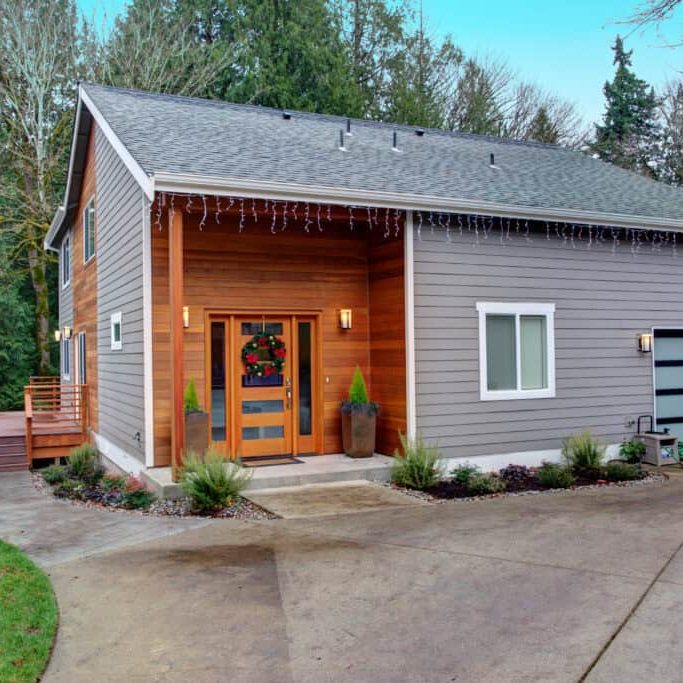 charming newly renovated home exterior with mixed siding
